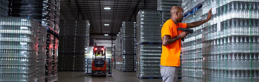 Warehousing Warehousing employee scanning inventory
